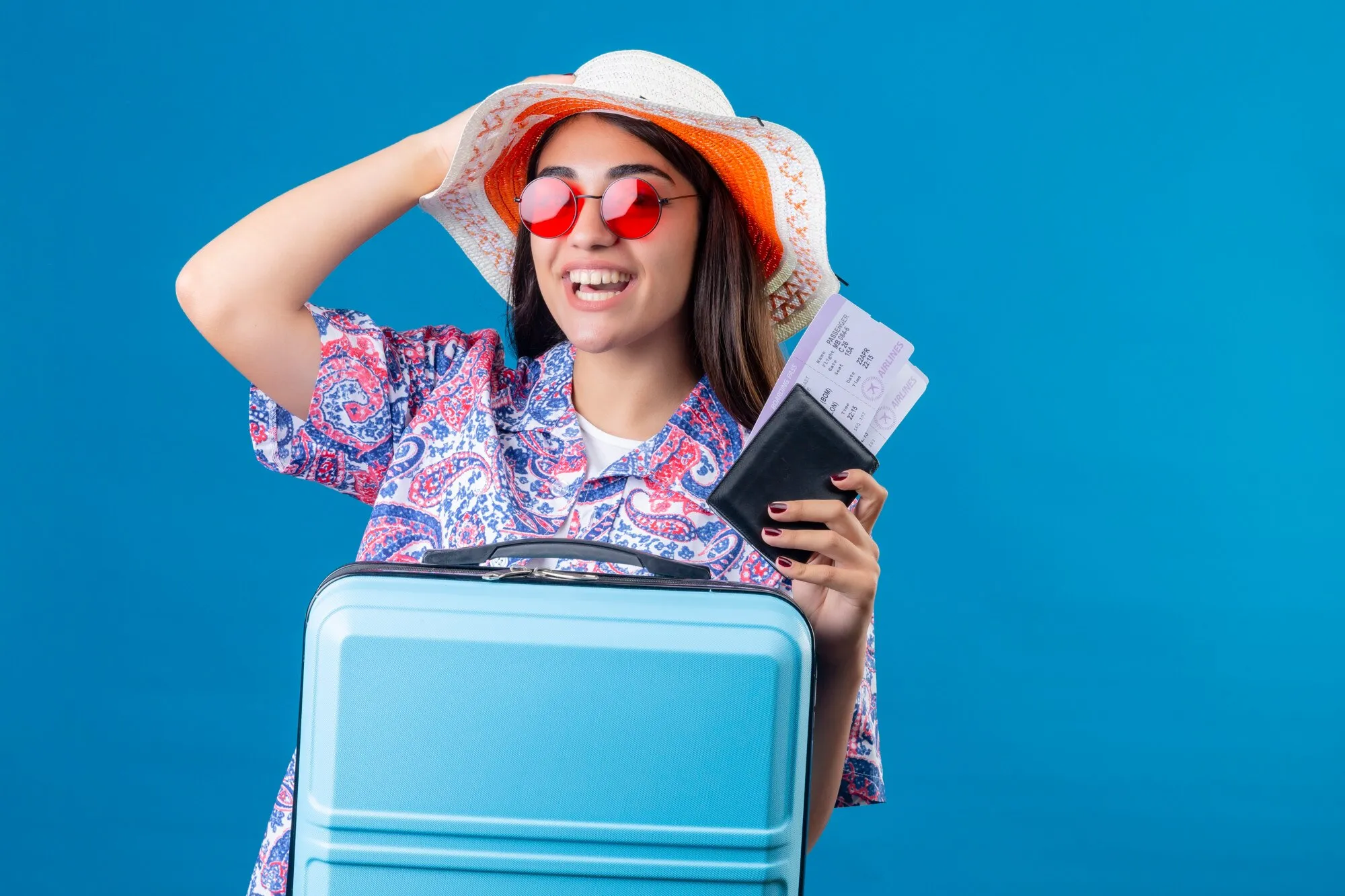 imgi_10_tourist-woman-with-hat-wearing-red-sungla